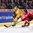 MONTREAL, CANADA - DECEMBER 28: Sweden's Jacob Larsson #4 clears the puck while Switzerland's Nando Eggenberger #22 chases him down during preliminary round action at the 2017 IIHF World Junior Championship. (Photo by Andre Ringuette/HHOF-IIHF Images)

